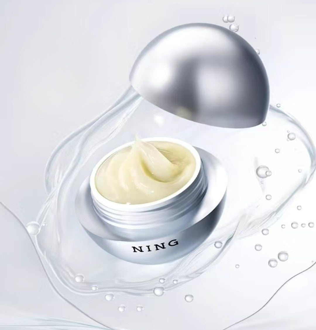 "NING Dermologie Tightening & Brightening Eye Serum box with caffeine, moisturizing and brightening benefits, 30g."