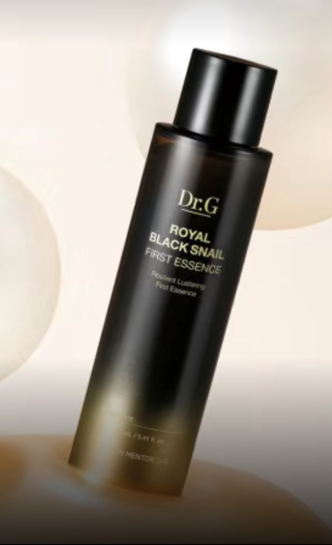 “Close-up of Dr. G Essence pump bottle – lightweight firming skincare for sensitive skin”