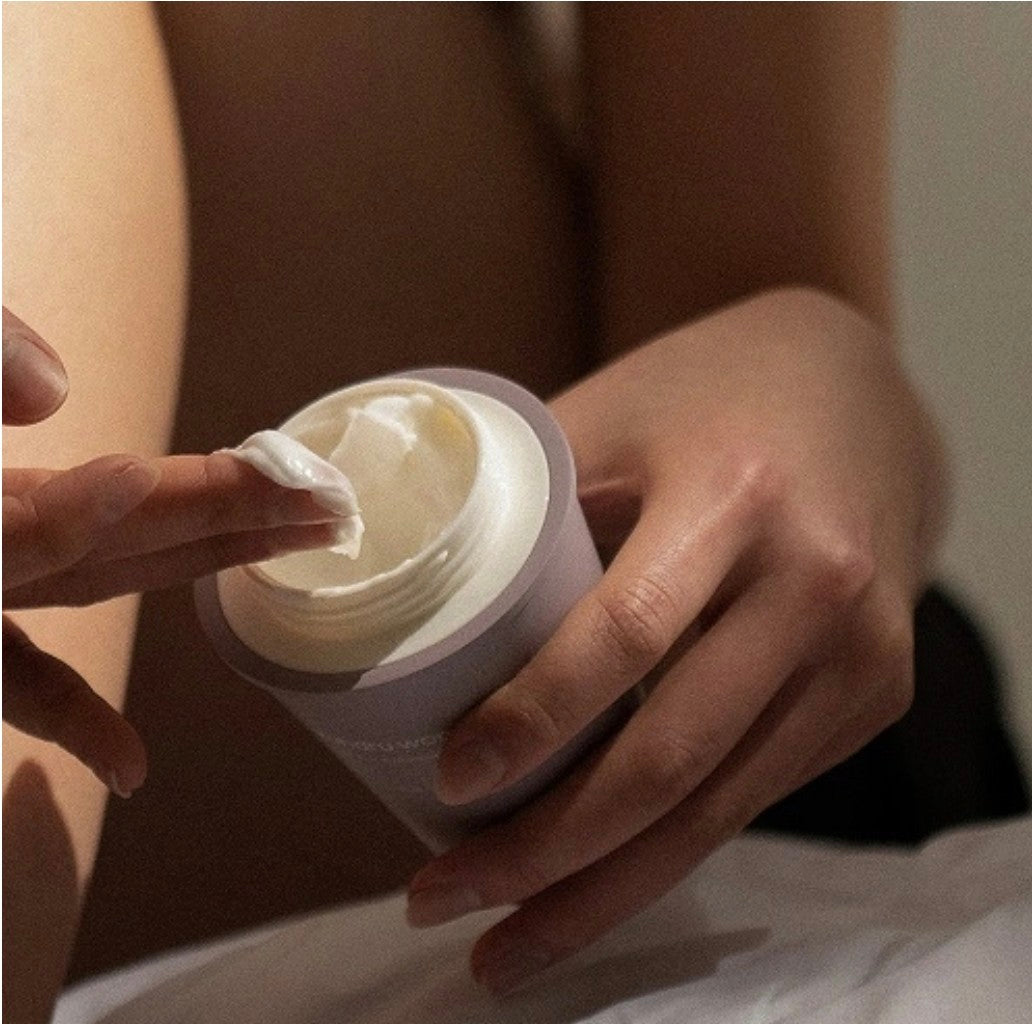 “Applying Haruharu Wonder Black Rice Cream – lightweight texture for deep hydration”