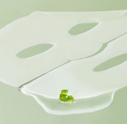 Silicone mold with leaf-shaped cavities on a light green background