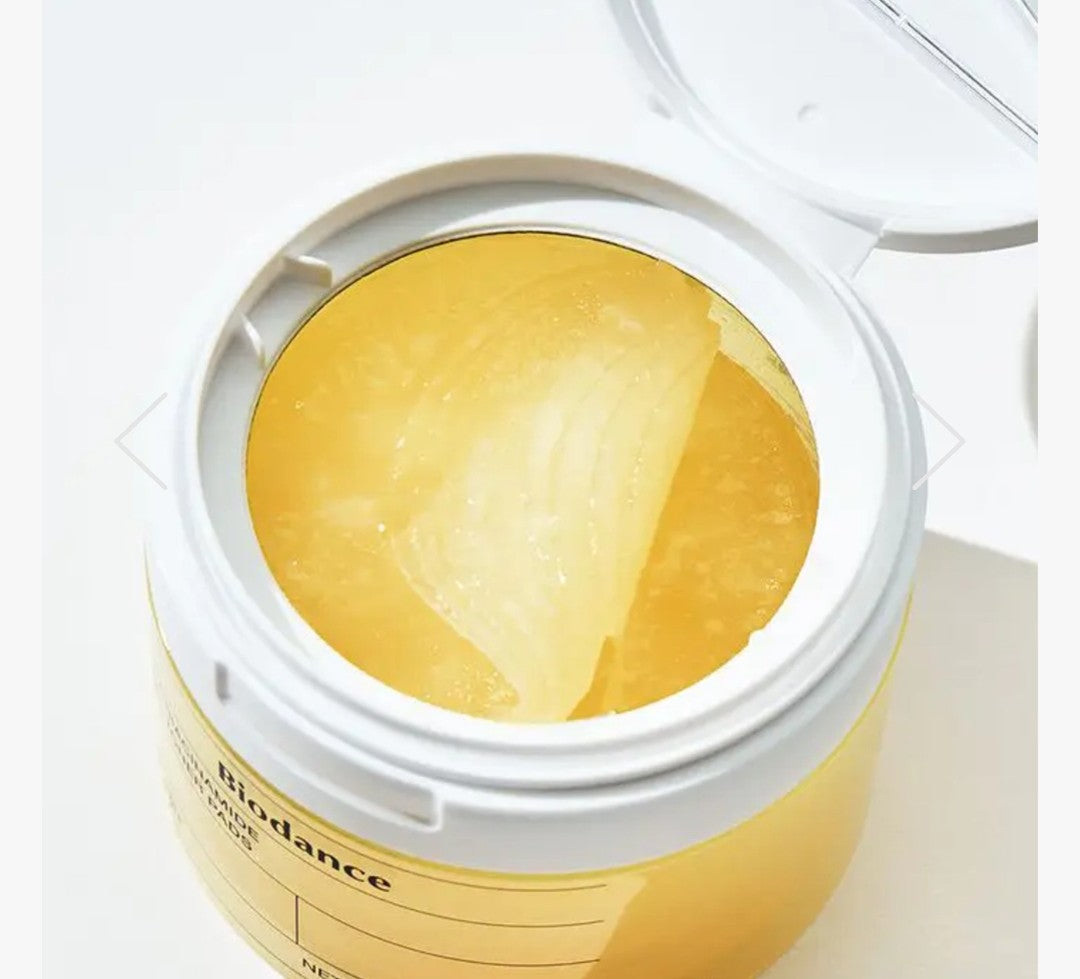 Jar of Biodance cream with a white lid on a light background