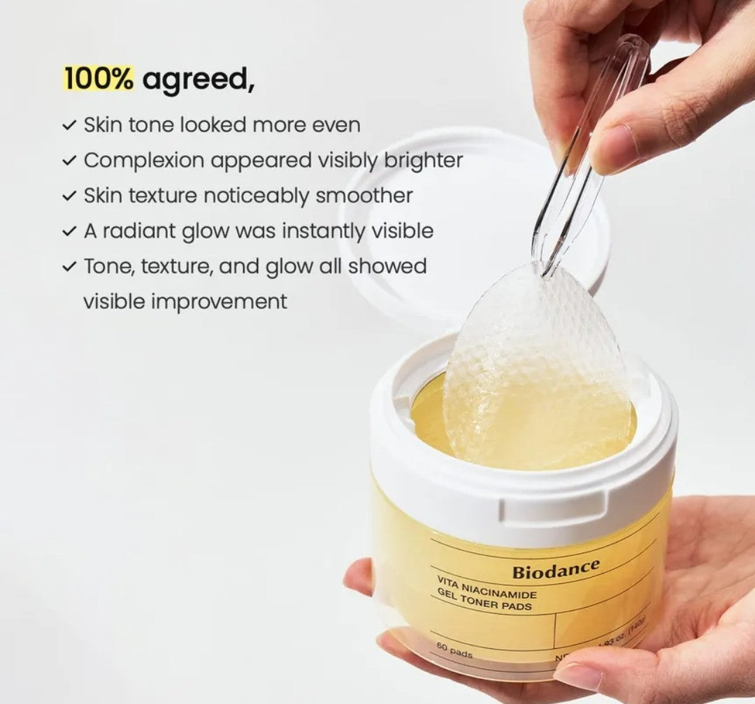Biodance Vita-Minamide Gel Toner Pads with a hand holding a spoonful of product, against a white background.