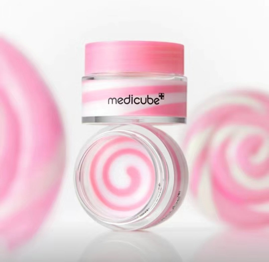 Pink and white jar with Medicube branding on a light pink background