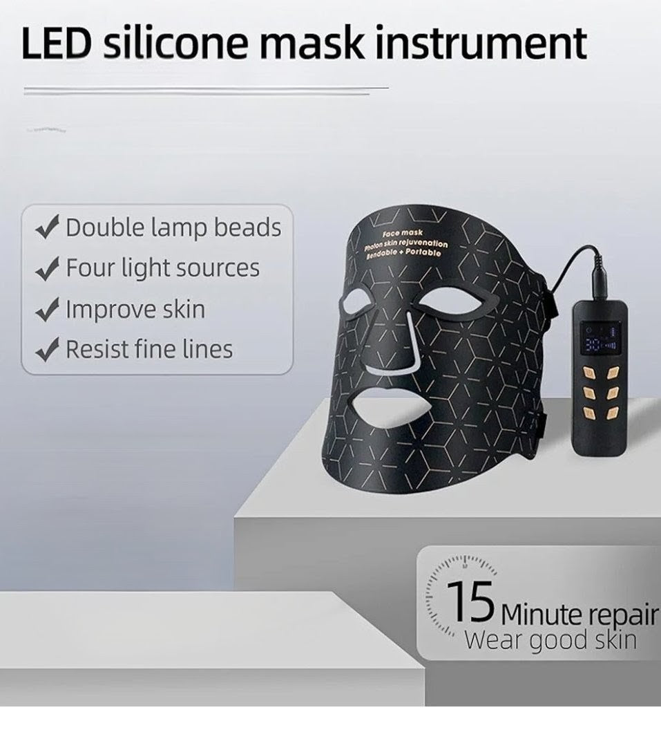 LED silicone mask instrument with power adapter on a gray surface