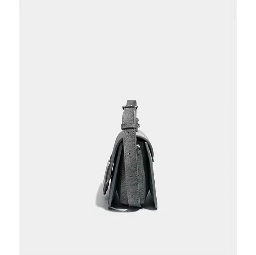 Gray leather bag on a white background