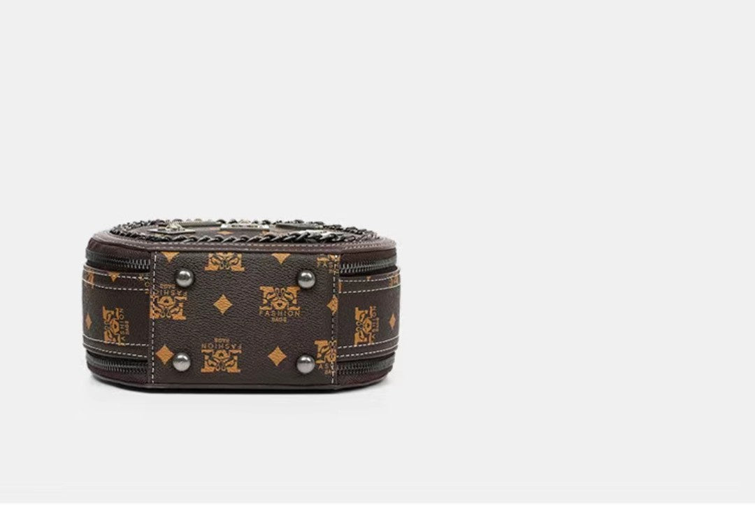 Decorative brown box with intricate patterns on a light gray background