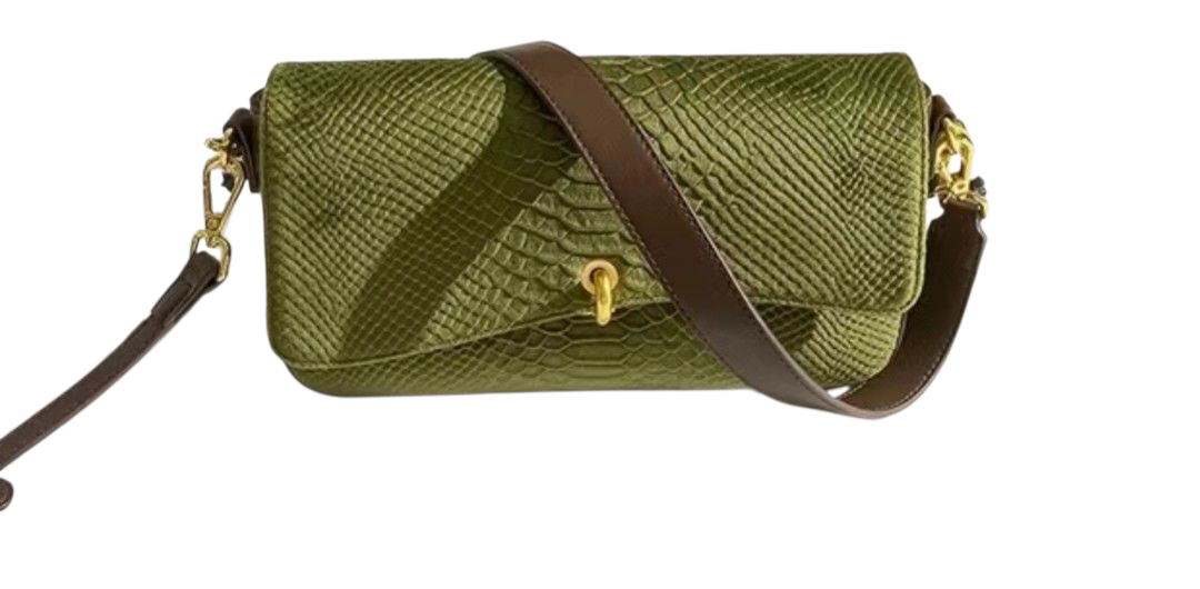 Green textured handbag with a brown strap on a white background