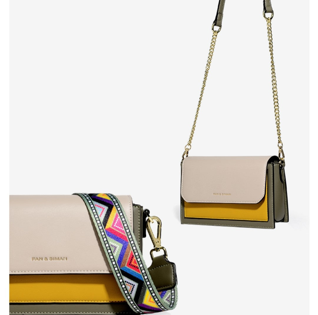 Two handbags with a colorful strap on a light gray background