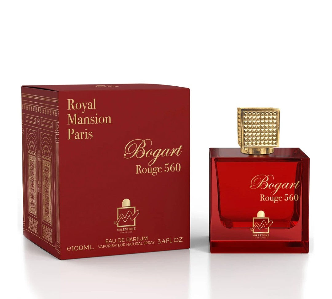 Red perfume bottle with gold cap and matching box labeled 'Bogart Rouge 560' by Royal Mansion Paris on a white background.