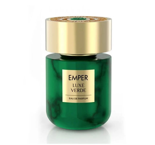 Green perfume bottle with gold cap on a white background