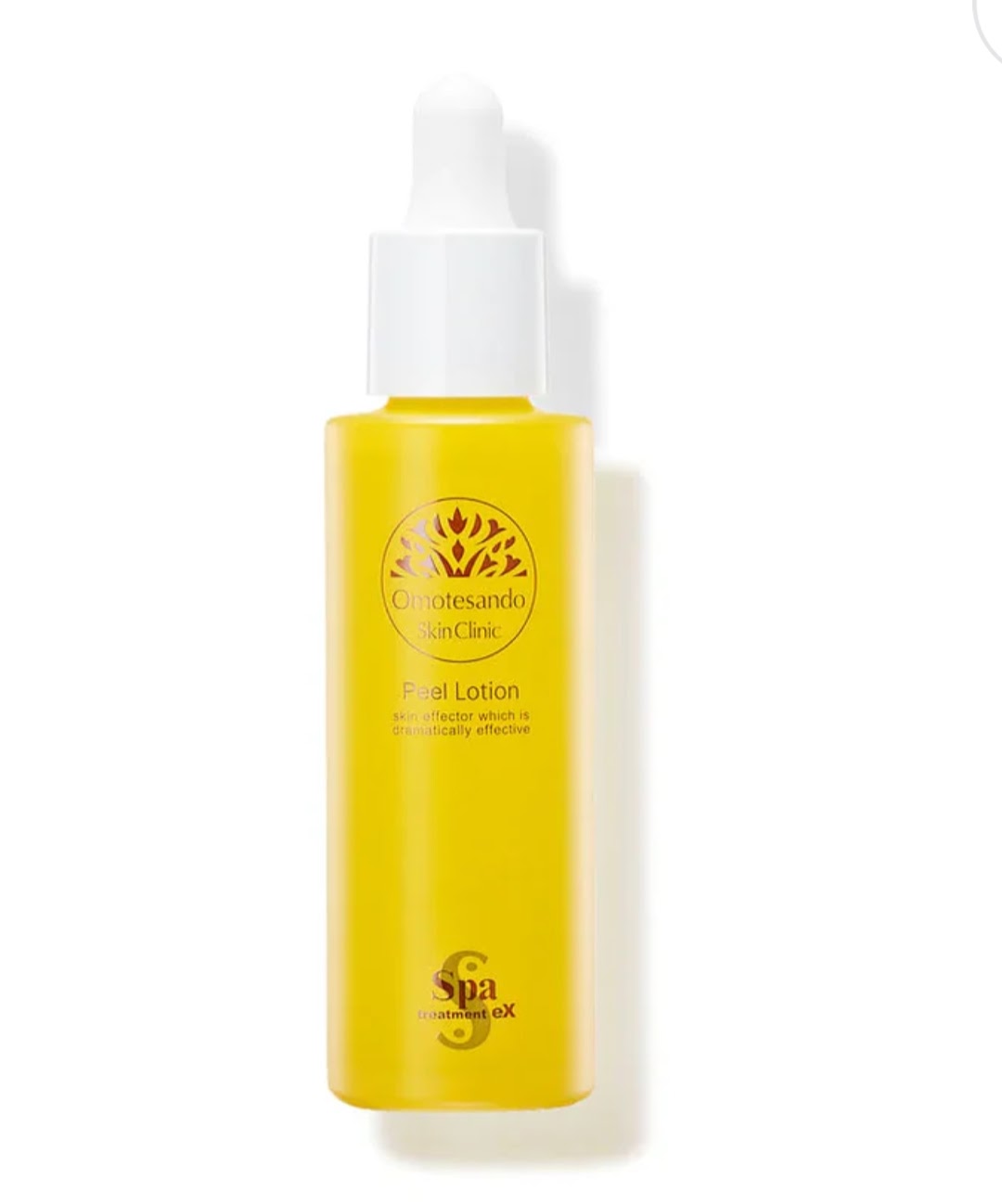 “Bright yellow bottle of Spa Face Peel Lotion exfoliating toner for soft, hydrated skin”