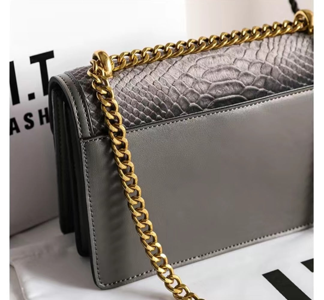 Elegant Snake-Pattern Shoulder Bag with Gold Chain & Scarf Detail – GlowBags Collection