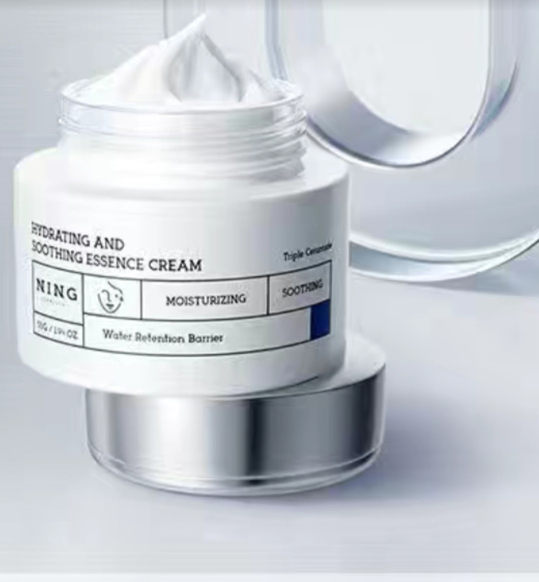 Open jar of Hydrating & Soothing Essence Cream showing creamy texture for soft and smooth skin