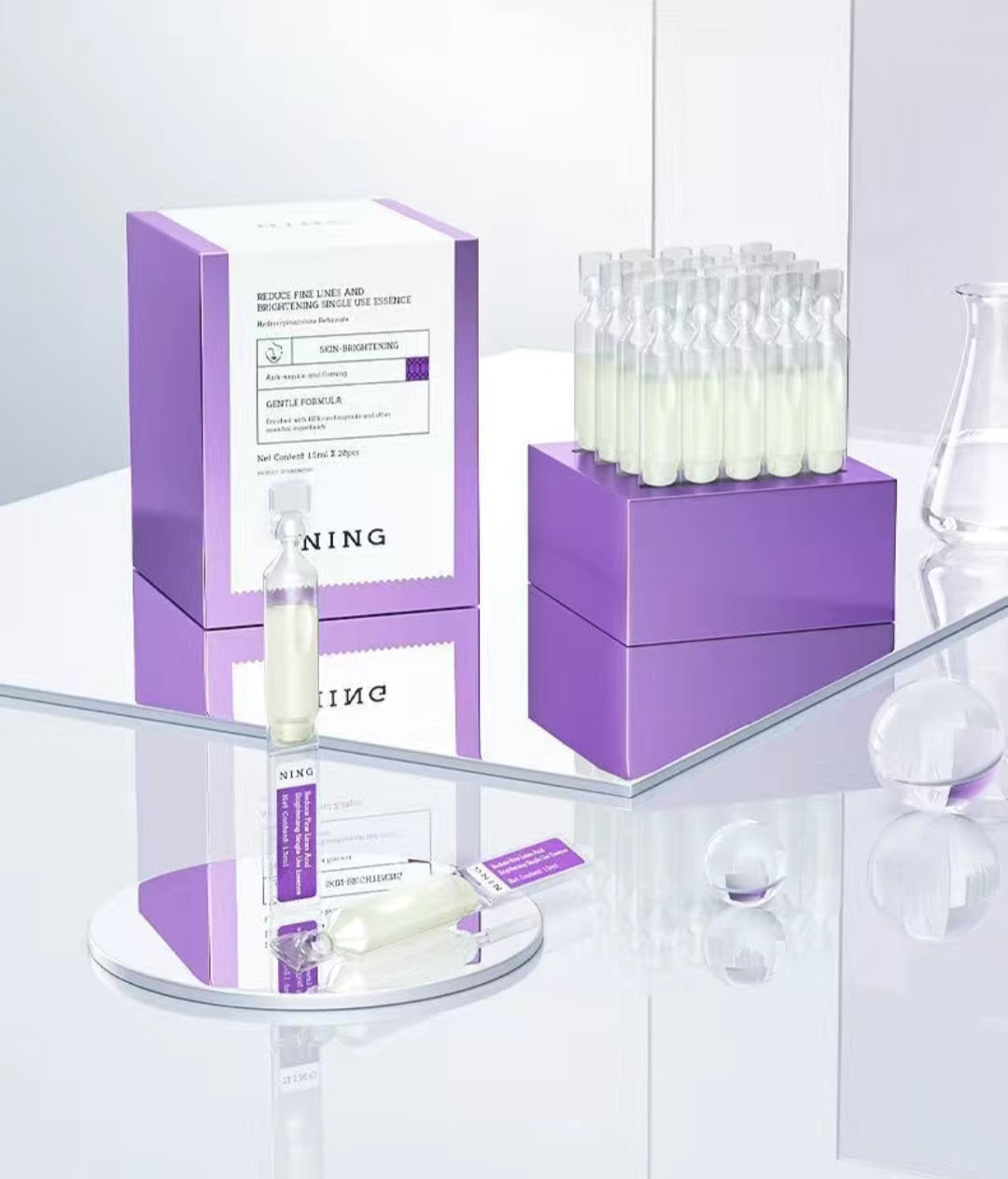 "Ning Essence Ampoule – Brightening and hydrating serum for fine lines, anti-aging skincare in a luxury purple box"