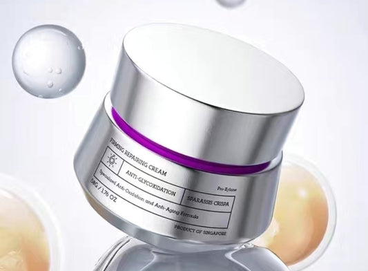 "Firming Repairing Cream jar with silver lid and purple band, labeled anti-glycoxidation, Pro-Xylane and Sparassis Crispa, 50g."