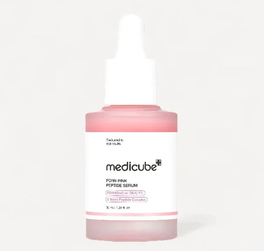 Medicube Pink Peptide Serum bottle on a white background