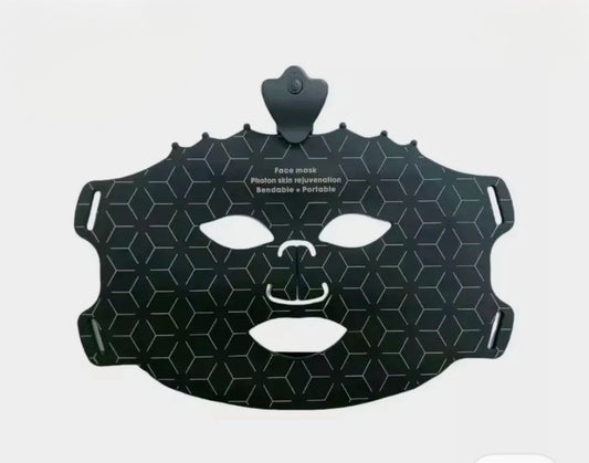 Black face mask with geometric design on a white background