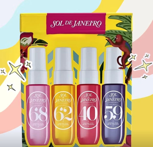 Four Sol de Janeiro perfume bottles with colorful packaging on a decorative background