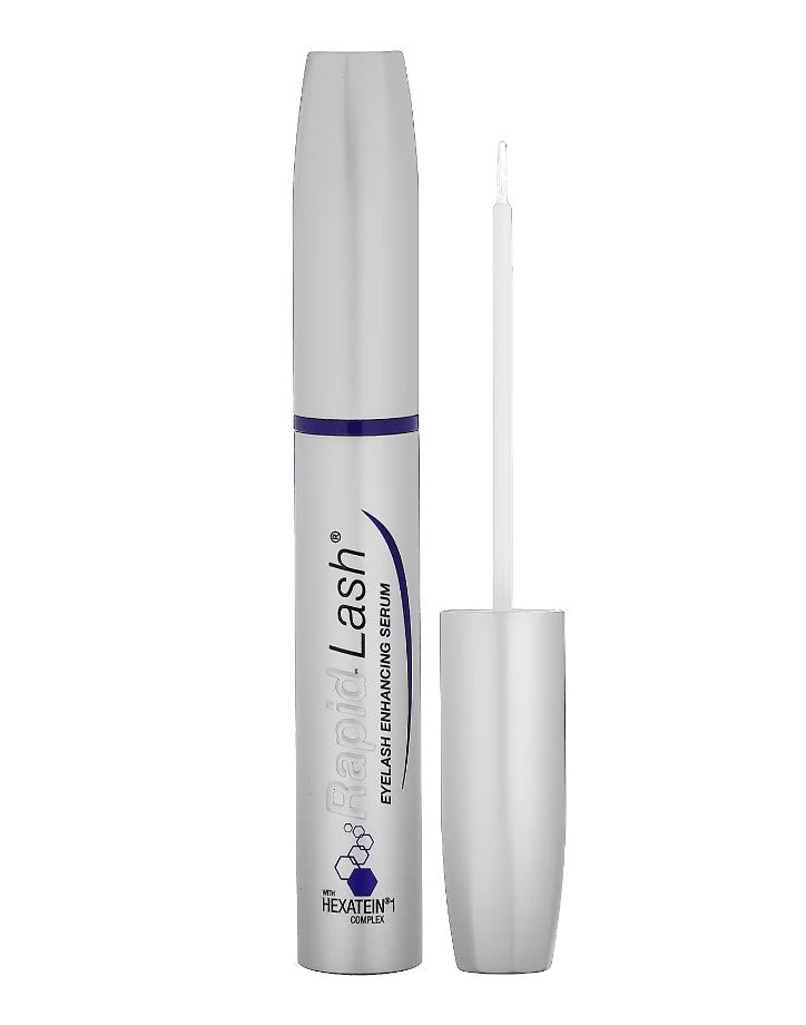 Eyelash serum with applicator on a white background