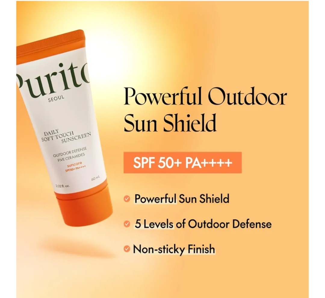Purito sunscreen tube with product details on an orange background