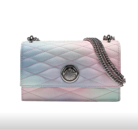 Quilted handbag with a chain strap on a white background