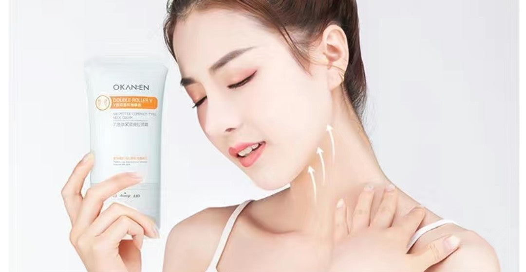 Woman applying skincare product with OKANEN packaging on a white background