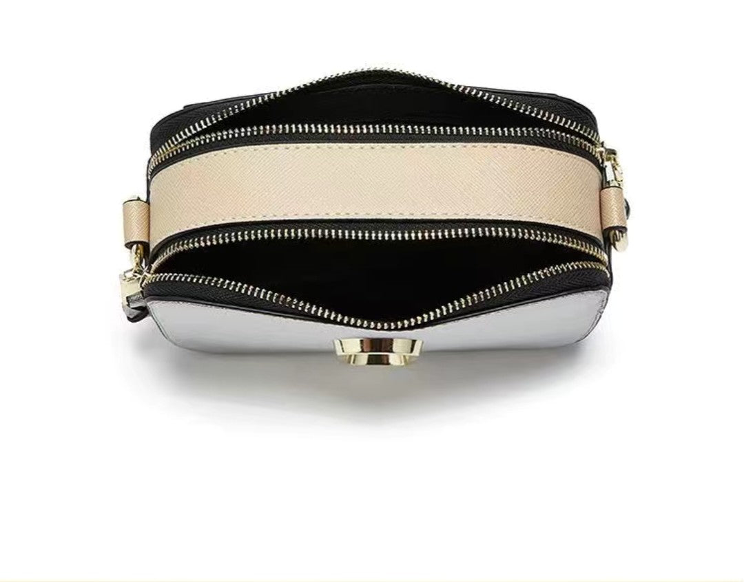 Multicolored pouch with zippers on a white background