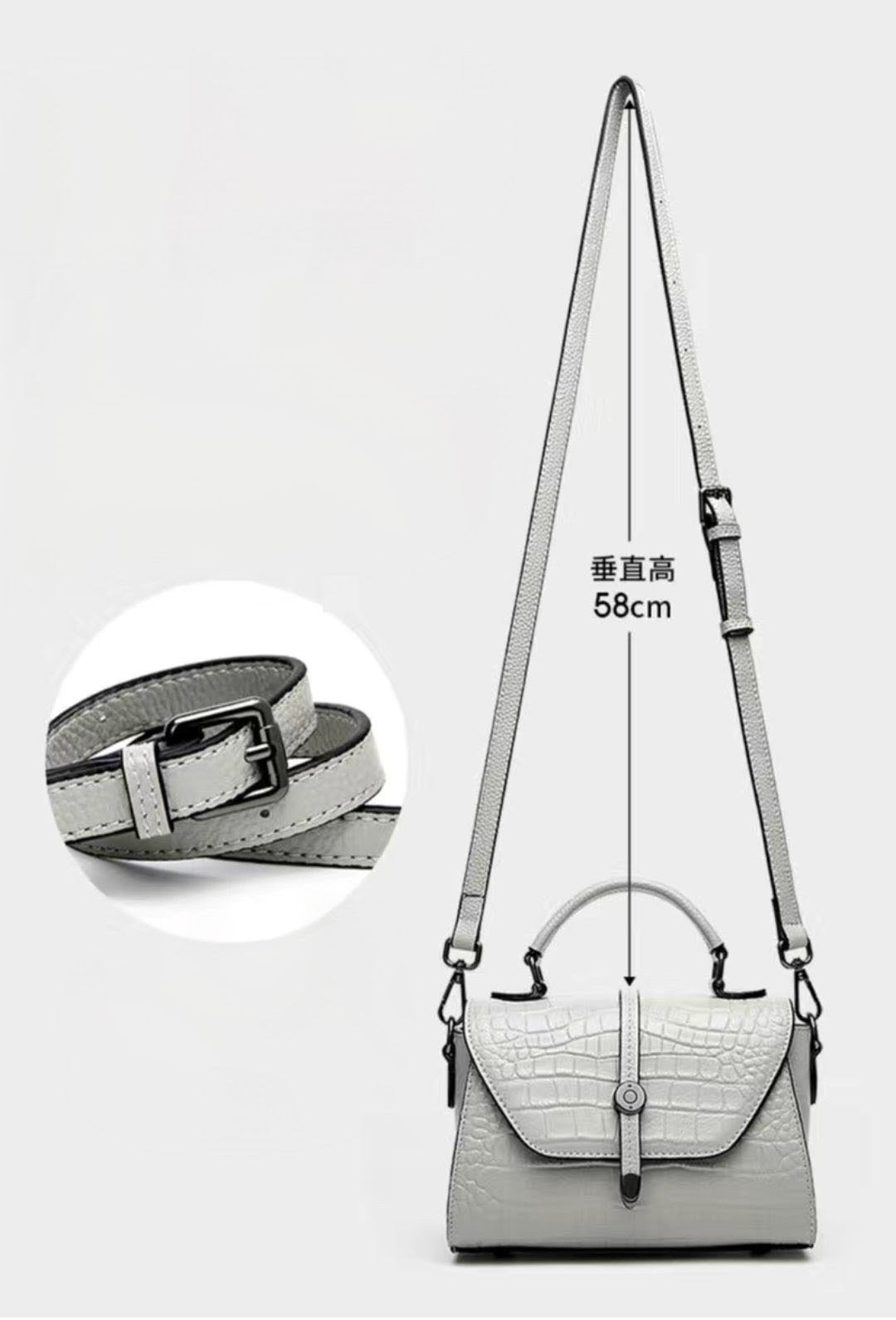 Gray handbag with a strap and measurements on a white background