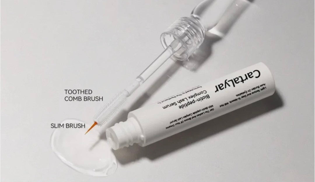 Catleyar skincare tool with toothed comb brush and slim brush on a light gray background