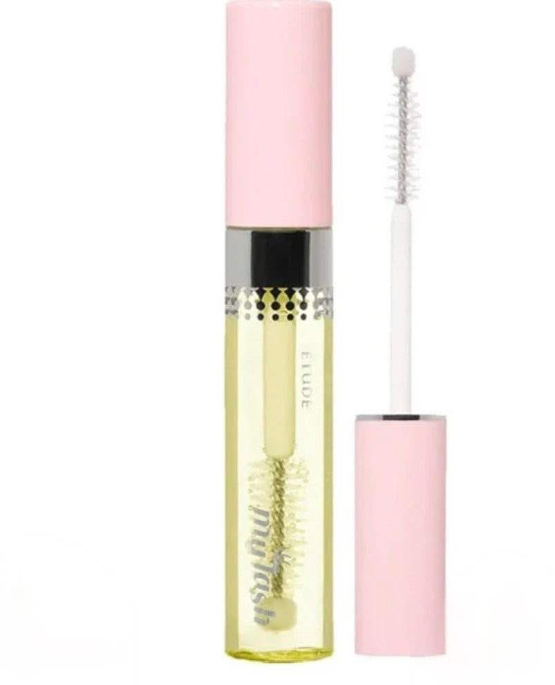 Mascara with pink cap and yellow body on a white background