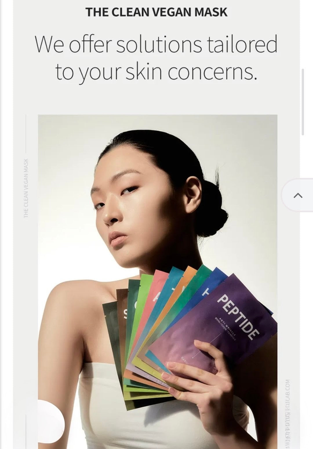 Woman holding a stack of colorful skincare masks with text about personalized skin care solutions.