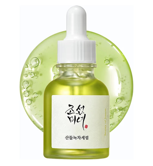 Skincare serum bottle with dropper on a white background