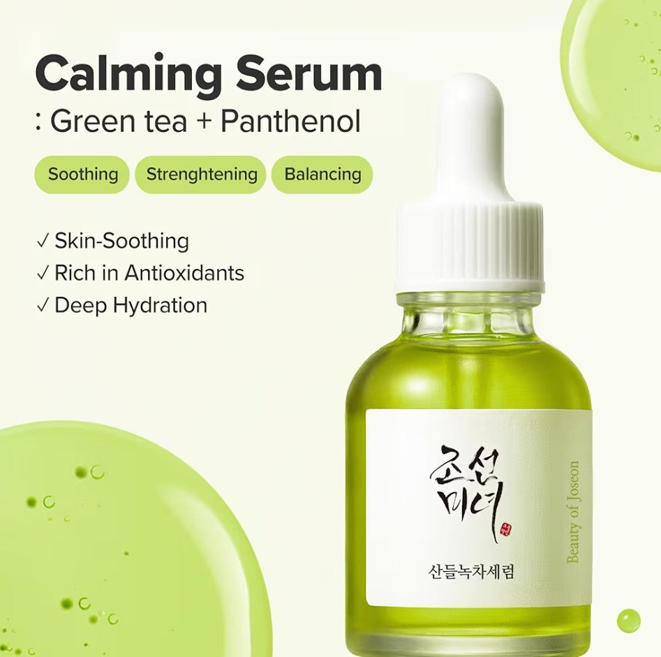 Calming serum bottle with green tea and panthenol ingredients on a light green background