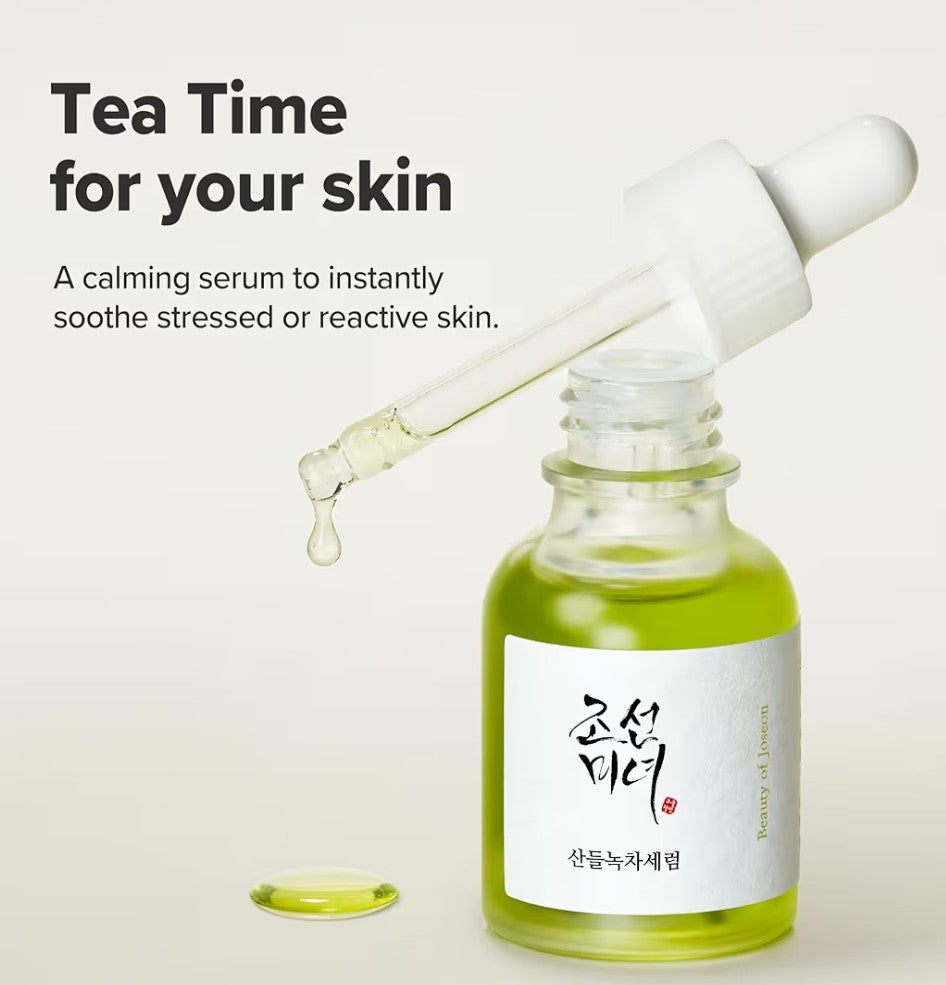 Skincare serum bottle with dropper on a light background, labeled 'Tea Time for your skin'.