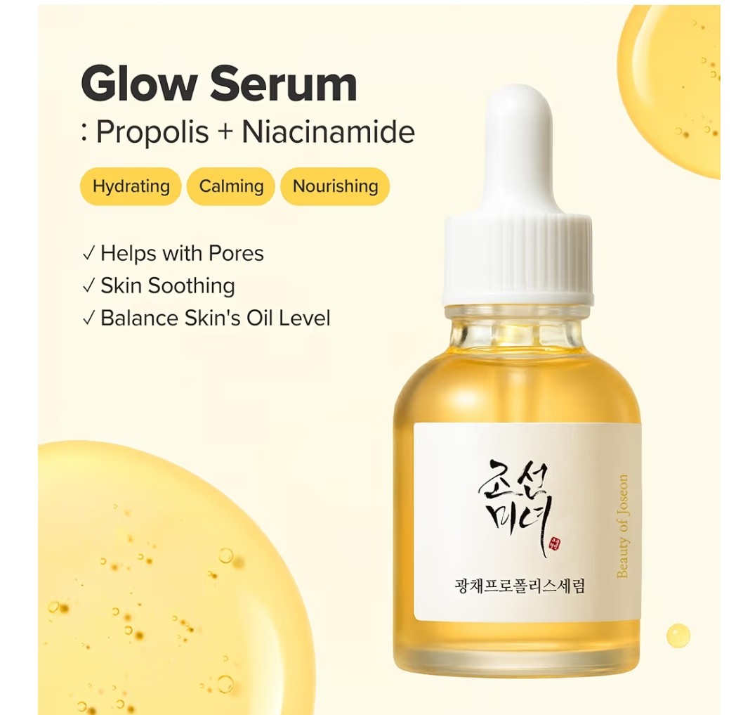 Glow Serum bottle with propolis and niacinamide on a yellow background