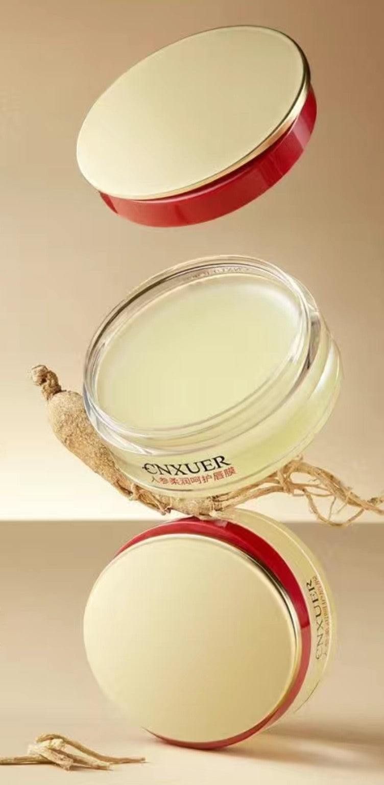 Cosmetic jar with red lid and visible brand name on a beige background