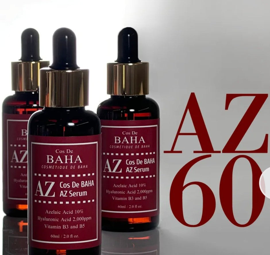 Cosmetic serum bottles with droppers on a reflective surface, featuring 'Cos De Baha' branding.