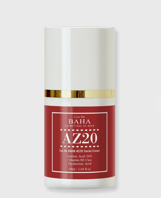 Cosmetic cream container with red label and gold accents on a white background