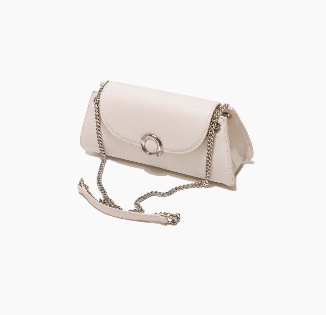 White handbag with a chain strap on a white background