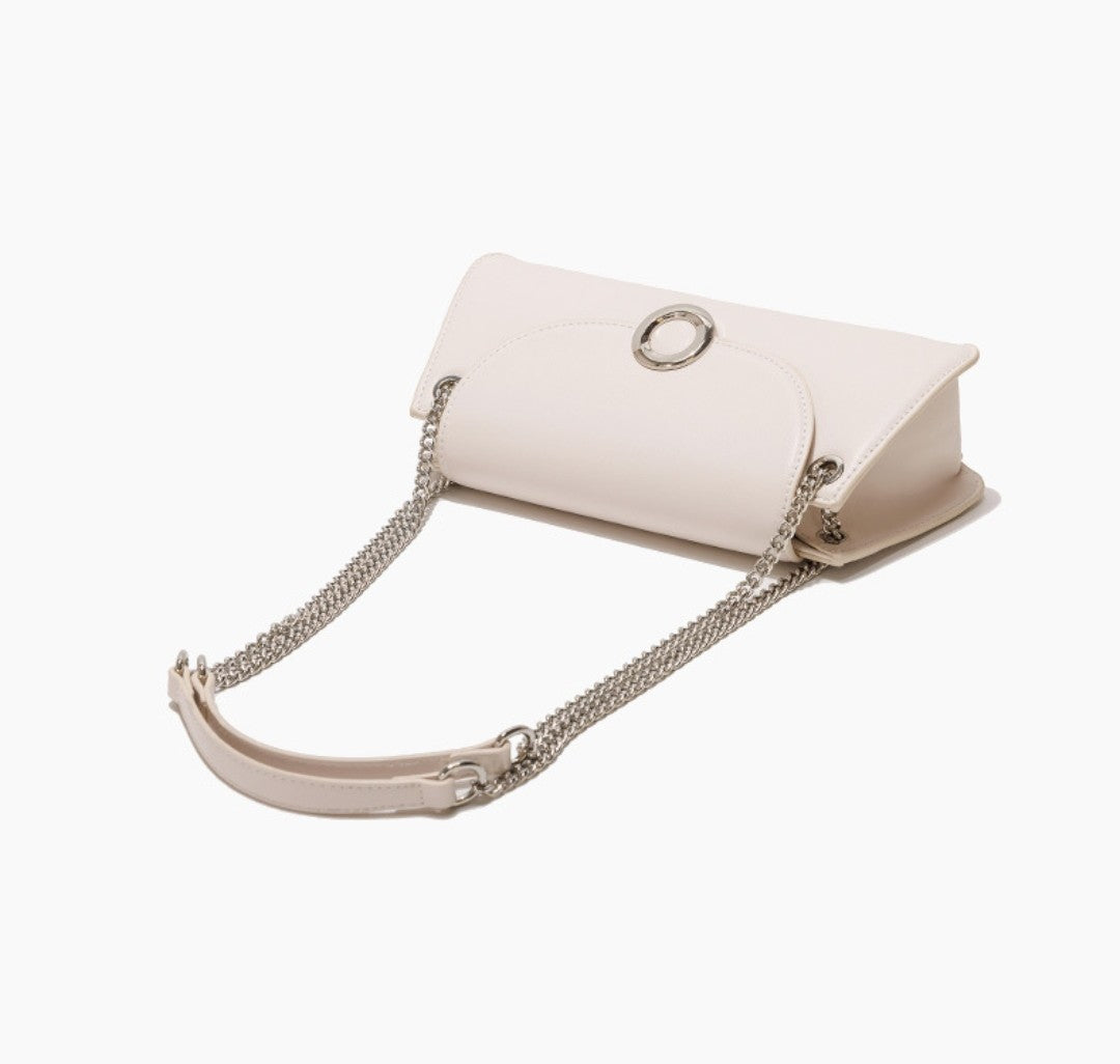 White handbag with a chain strap on a white background