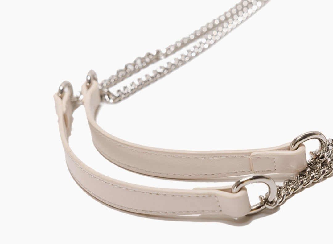 White leather choker with silver chain on a white background